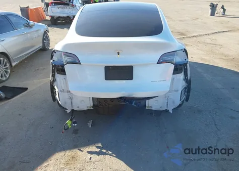 2020 Tesla Model Y Long Range Dual Motor All-Wheel Drive из США, поврежденный, VIN 5YJYGDEEXLF032048